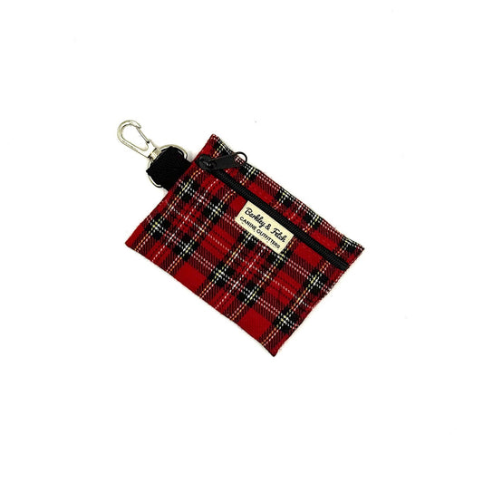 Red plaid pouch with a keychain on a white background