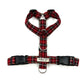 Red and black plaid dog harness with visible brand name on a white background handmade in the UK by Barkley And Fetch