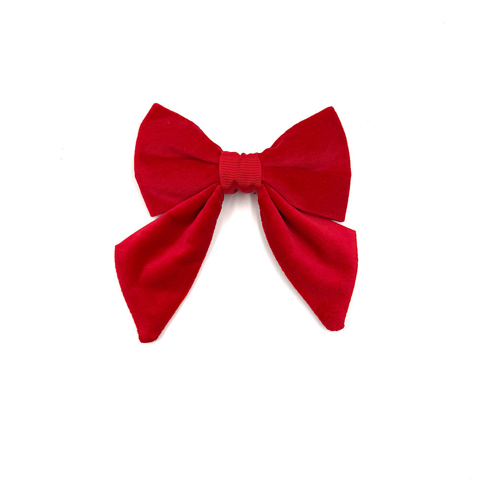 Red bow on a white background handmade by Barkley And Fetch