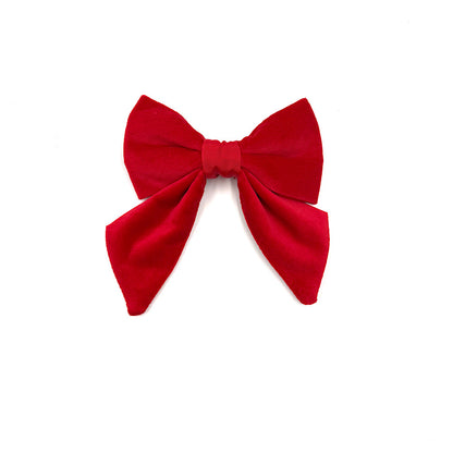 Red bow on a white background handmade by Barkley And Fetch