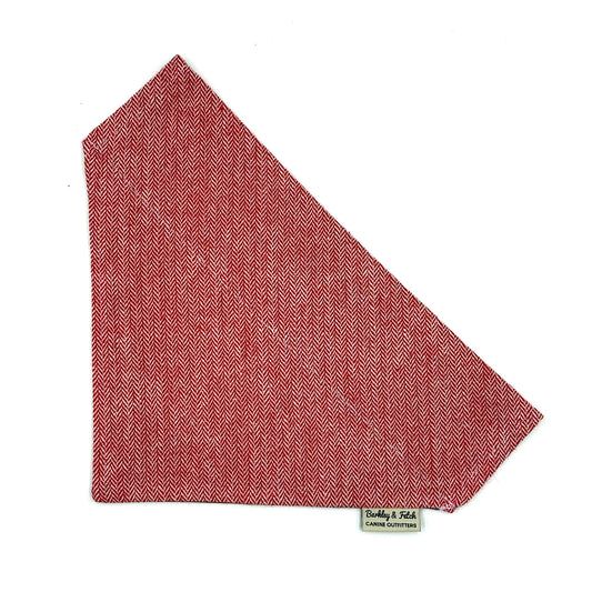 Red herringbone patterned bandana with a brand label on a white background