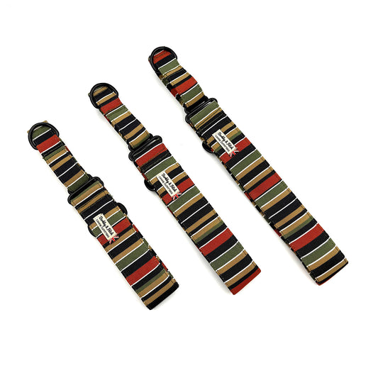 Three striped watch straps on a white background