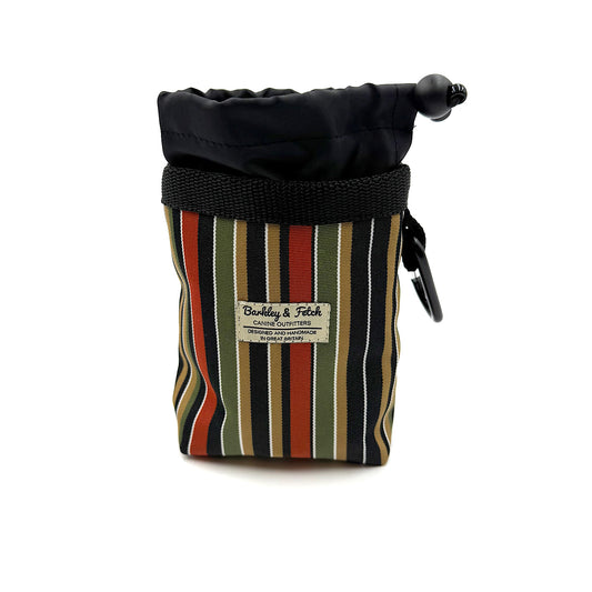 Striped drawstring pouch with a label on a white background