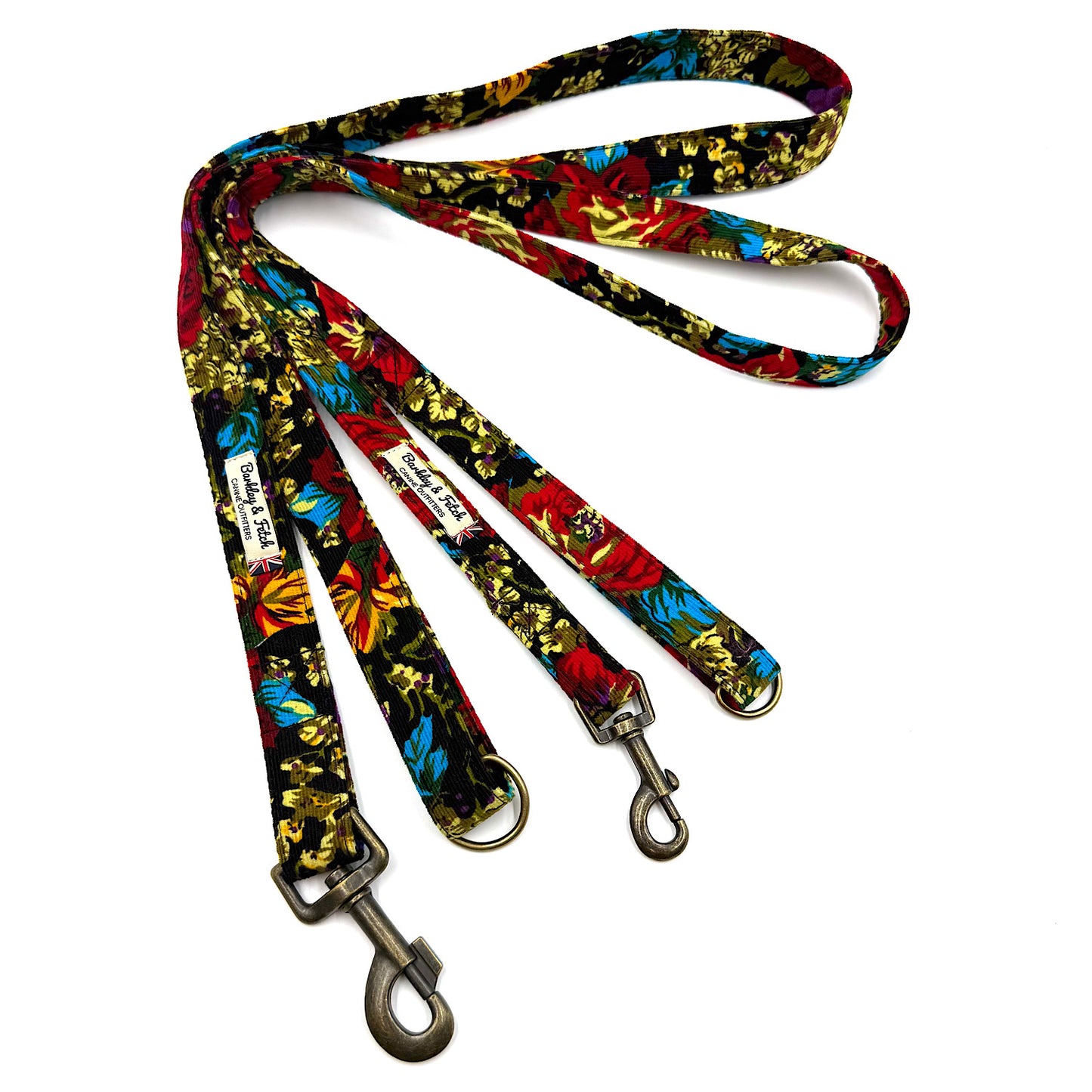 Colorful dog leash with floral pattern on a white background