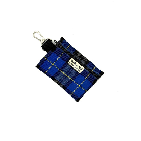 Blue plaid pouch with a key ring on a white background
