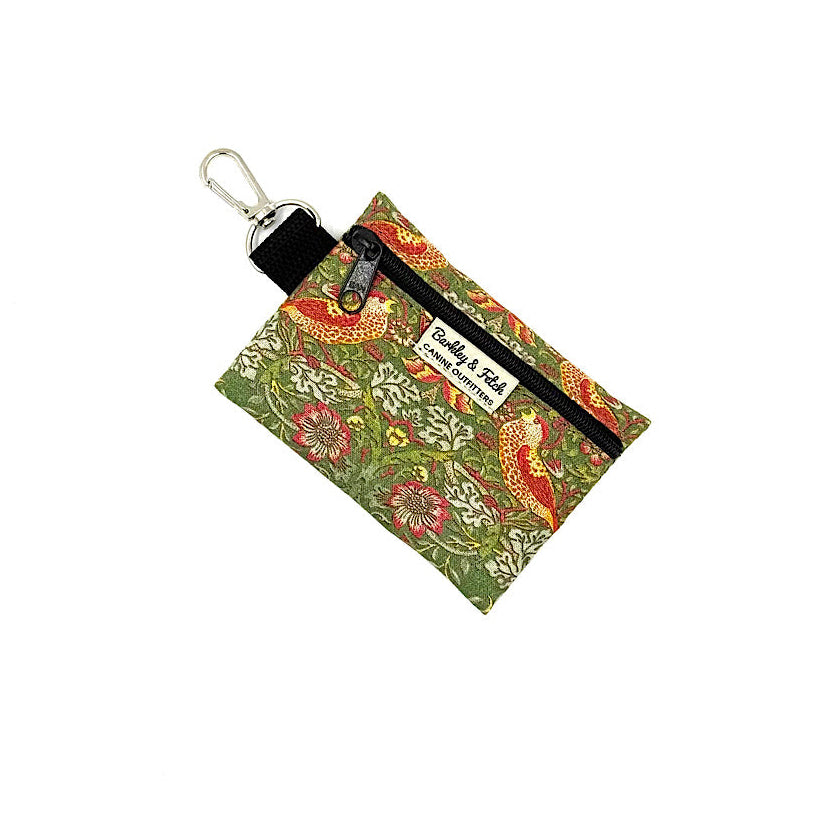 Small pouch with floral design and keychain clip on a white background