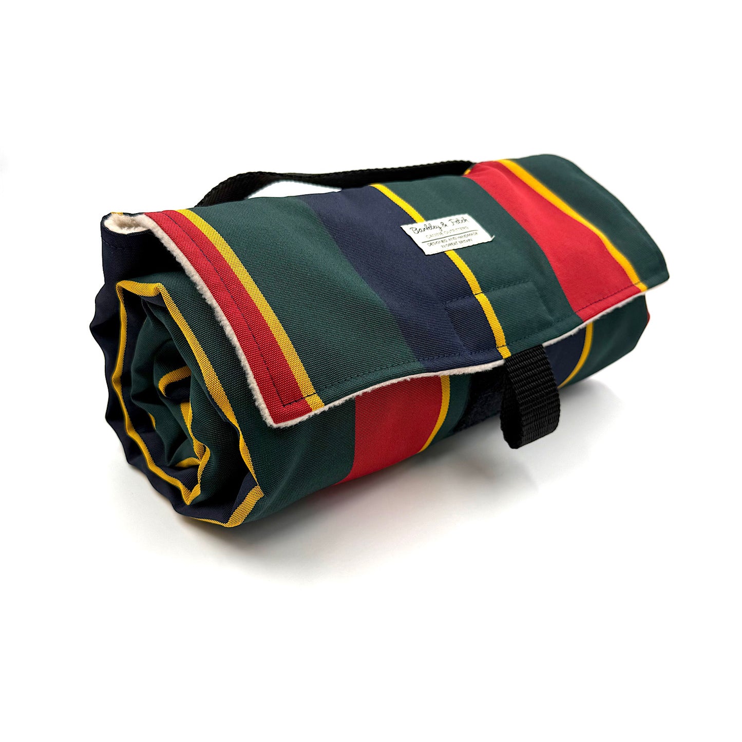 Colorful striped settle mat with a visible brand label on a white background handmade in UK by Barkley And Fetch