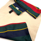 Colorful striped fabric settle mat with red, green, and blue pattern on a beige background handmade in UK by Barkley And Fetch