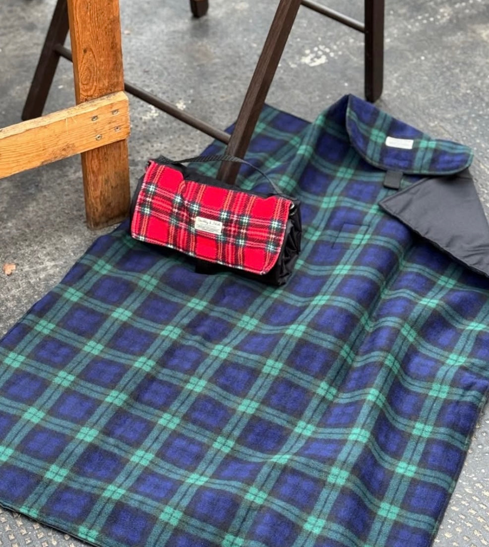 black watch tartan settle mat British handmade by Barkley and Fetch on a tarmac floor