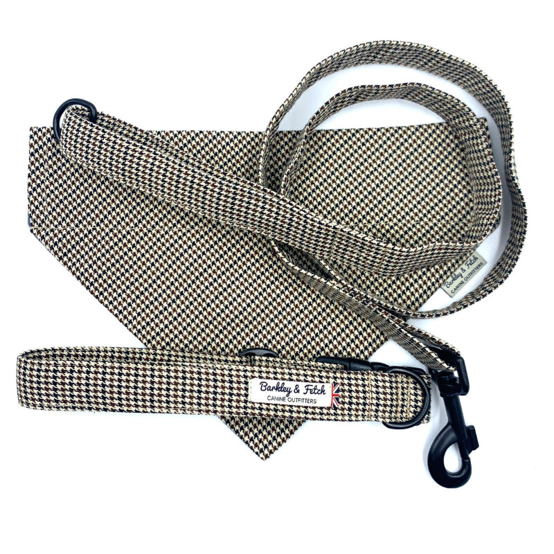 Houndstooth patterned dog leash with matching pouch on a white background