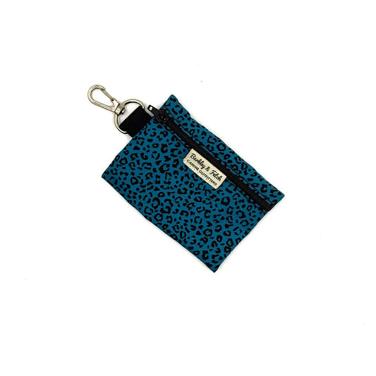 Blue leopard print pouch with a keychain on a white background