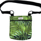 Green leaf-patterned bag with a black strap on a white background handmade by barkley and fetch uk