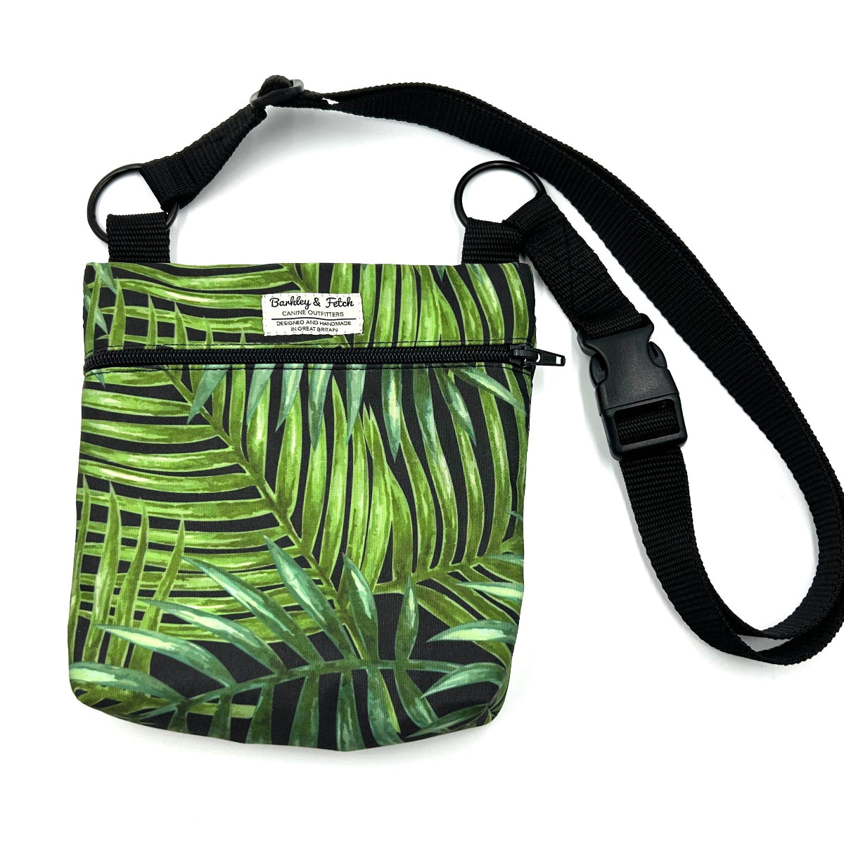 Green leaf-patterned bag with a black strap on a white background handmade by barkley and fetch uk