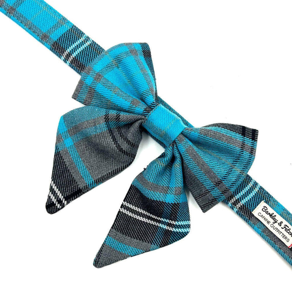 Plaid dog collar with bow tie and brand label on a white background handmade in uk by barkley and fetch