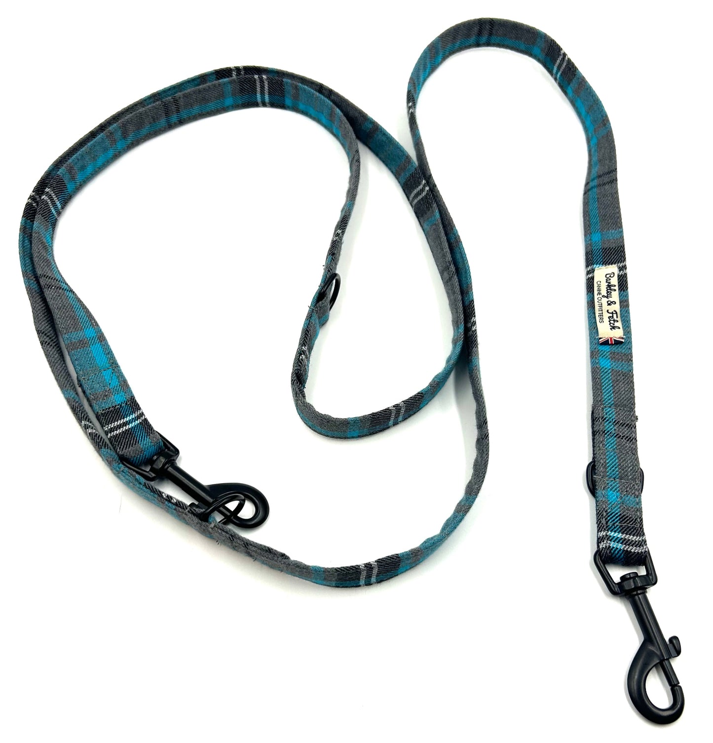 Plaid patterned dog leash on a white background