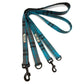 Plaid dog leash with black metal clips on a white background
