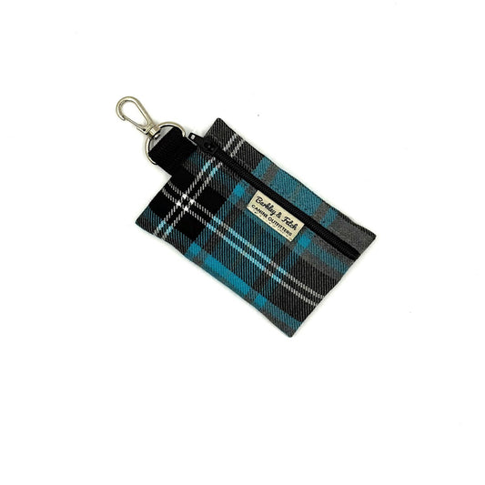 Plaid pouch with keychain attachment on a white background