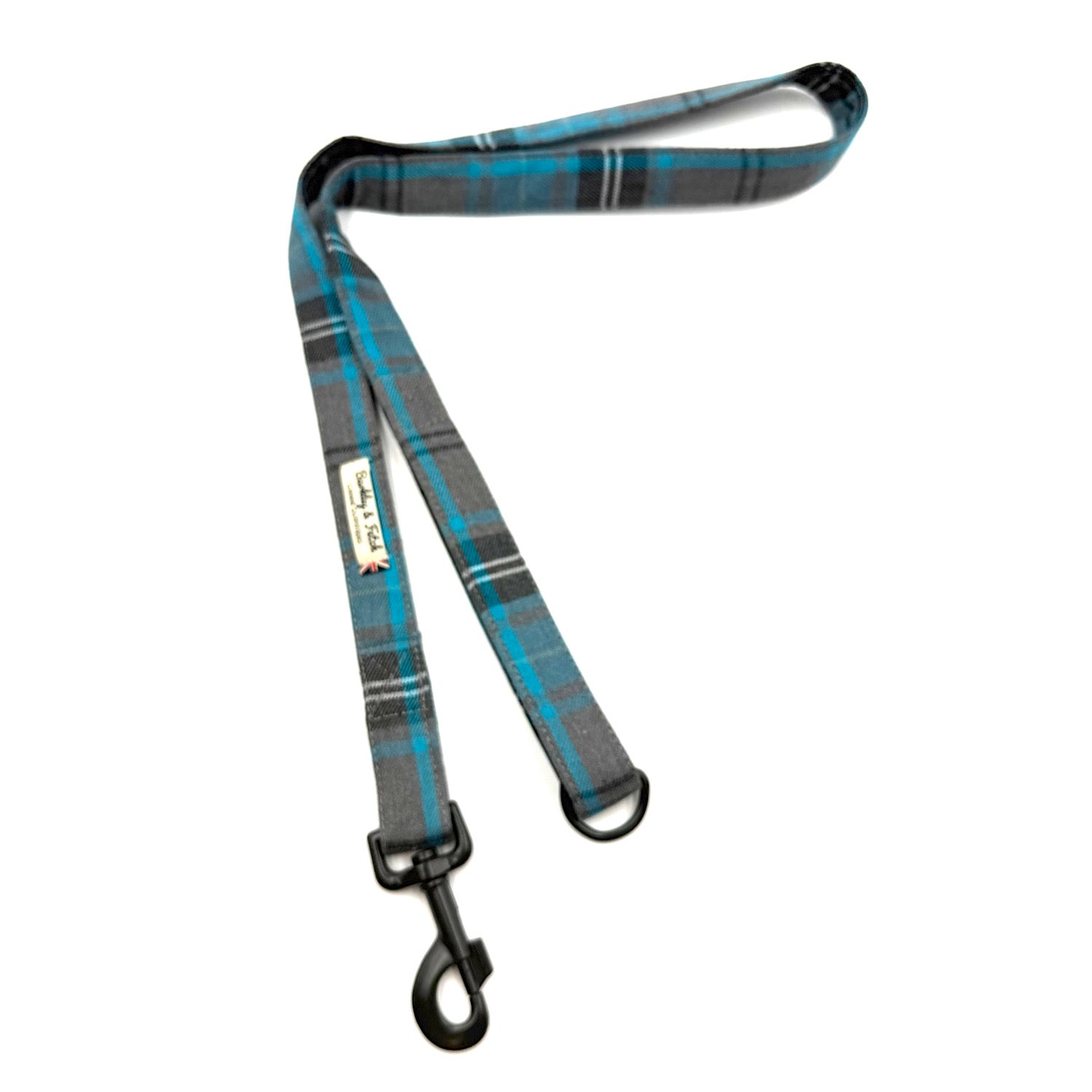 Plaid dog leash with black clip on a white background