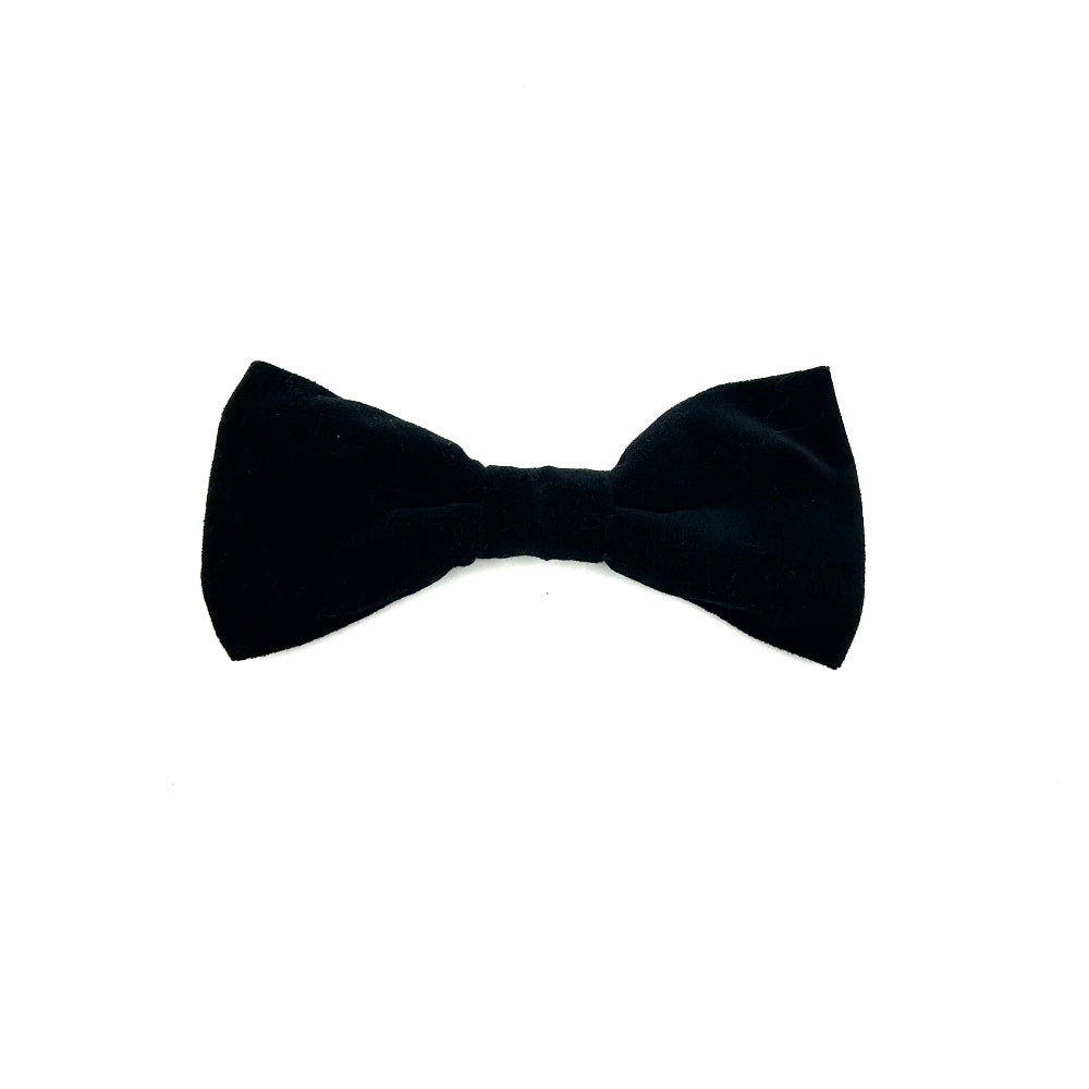 Black luxury handmade velvet bow tie on a white background by Barkley and fetch Great Britain