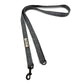 Grey checkered dog leash with a clip on a white background