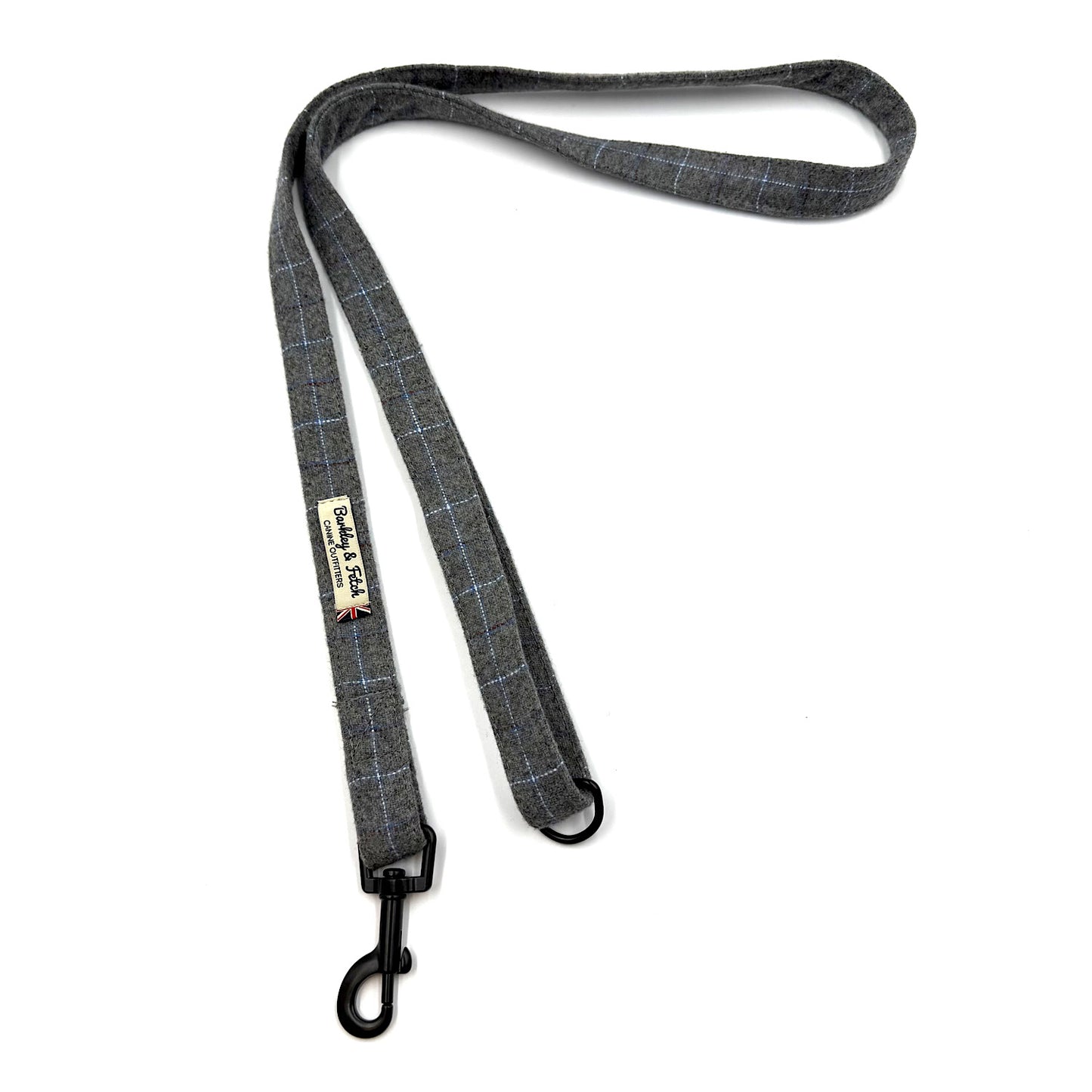 Grey checkered dog leash with a clip on a white background