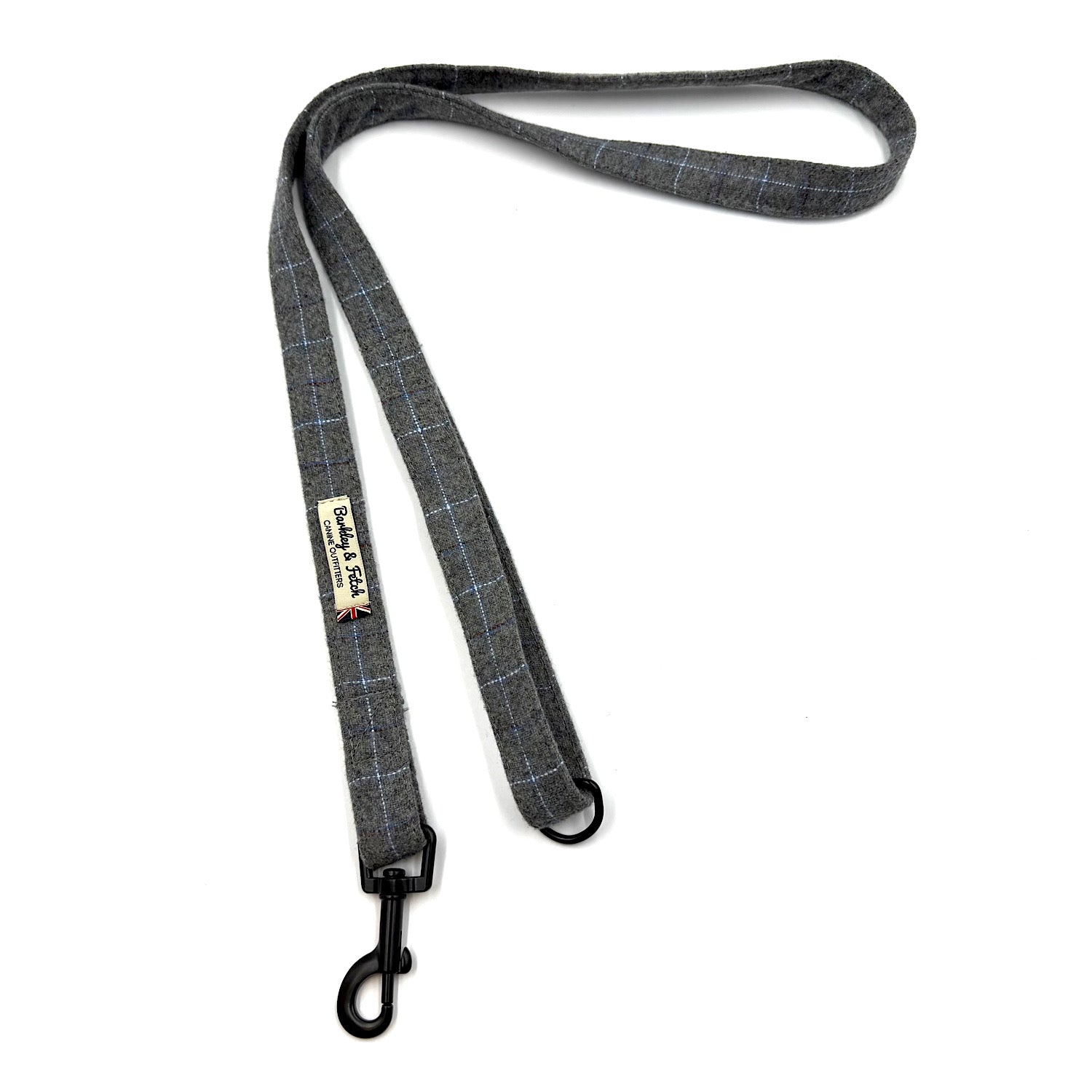 Grey checkered dog leash with a clip on a white background