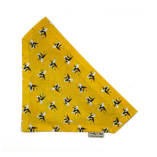 Yellow bandana with bee pattern on a white background