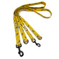 Yellow dog leash with black clip and pattern on a white background