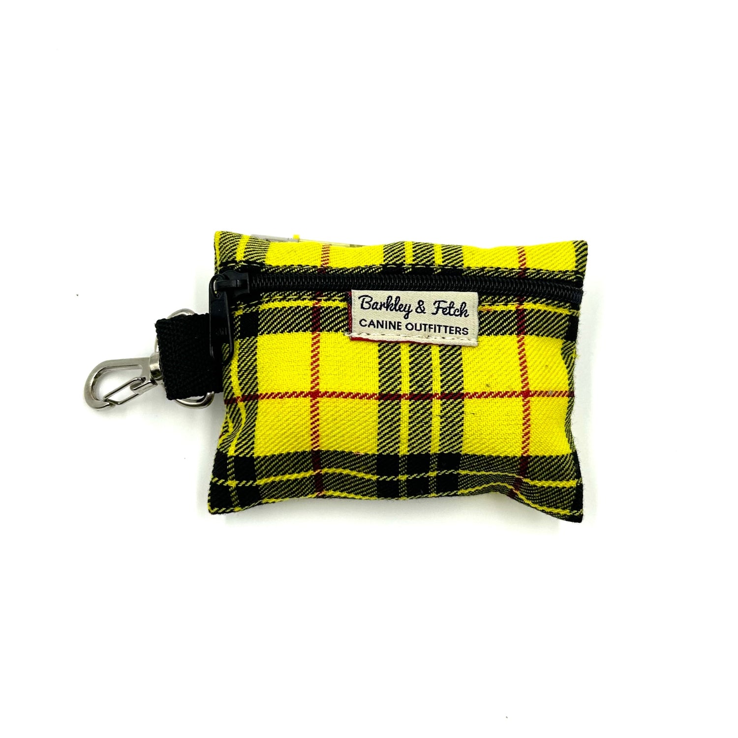 A yellow tartan patterned poo bag holder with a black clip and the brand name 'Barkley & Fetch' on a label.