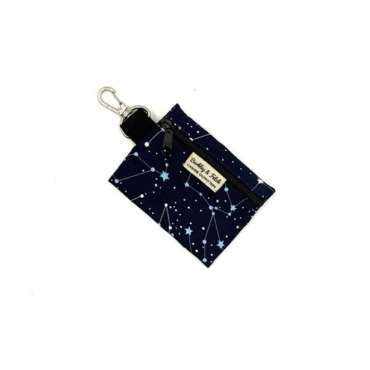 Small pouch with star pattern and keychain clip on a white background