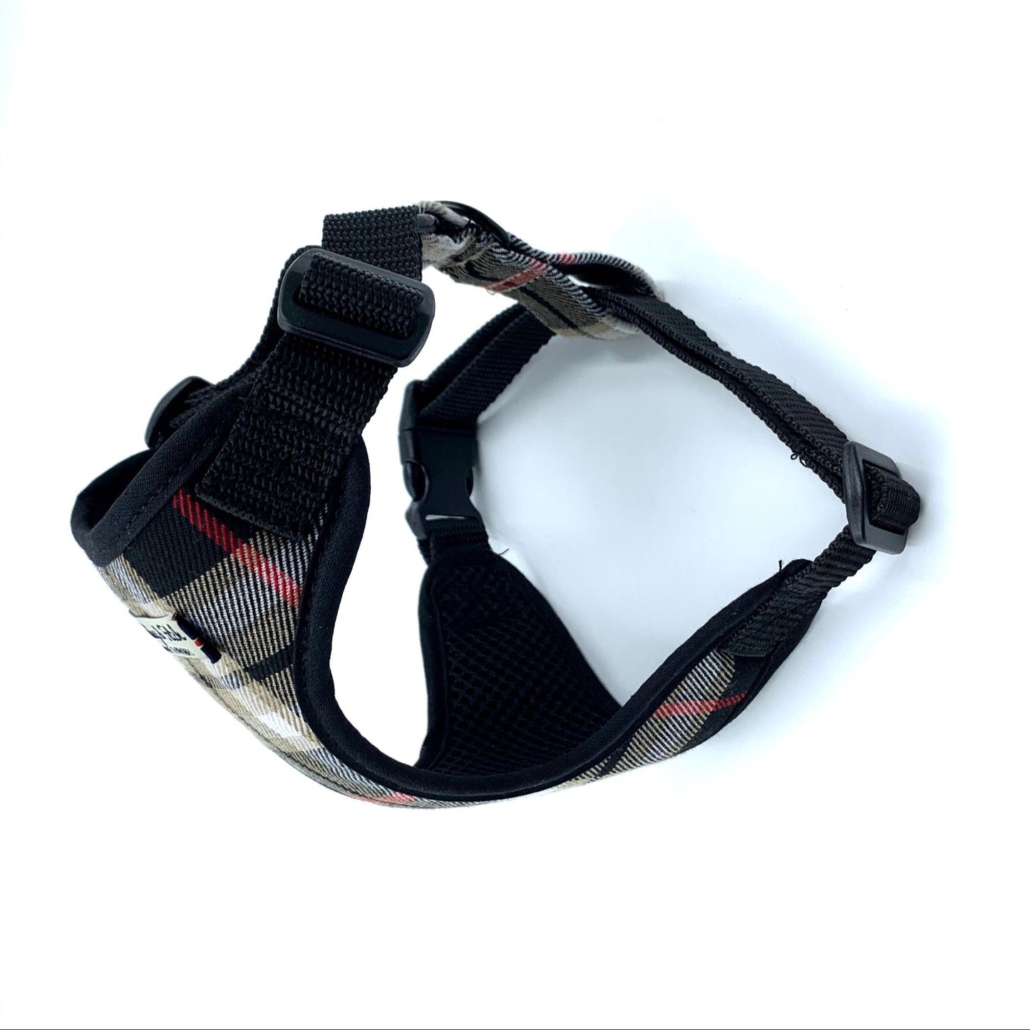 Black dog harness on a white background