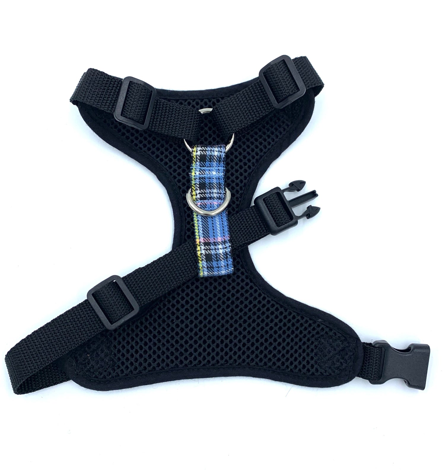 Black dog harness with plaid strap on a white background