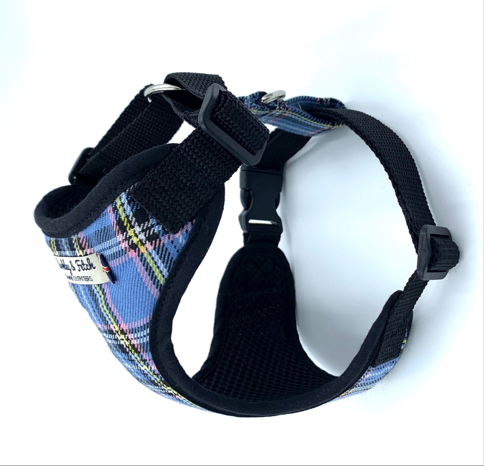 Dog harness with blue plaid pattern and black straps on a white background