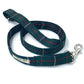 Green and navy tartan dog lead with silver hardware on a white background