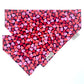 Heart-patterned bandana with a visible brand label on a white background