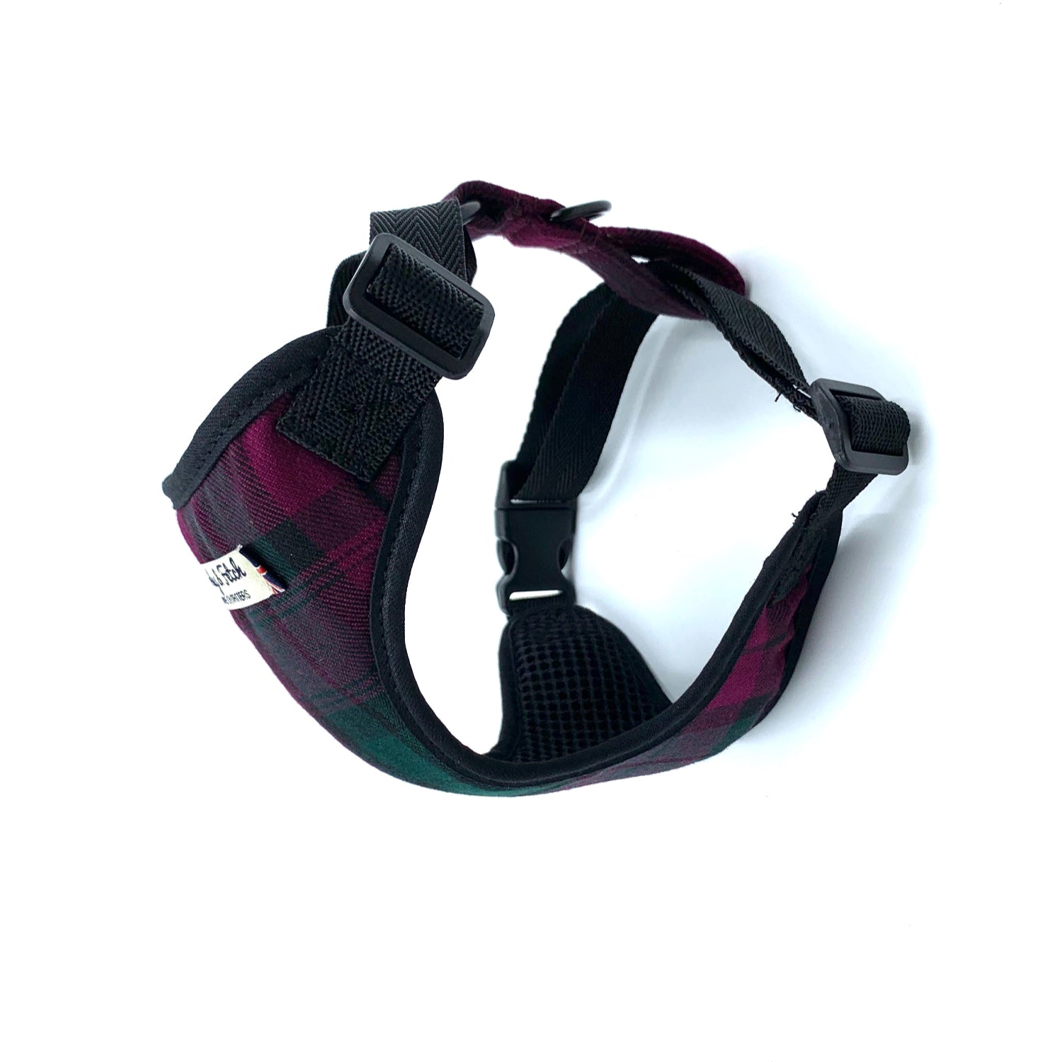 Plaid-patterned dog harness on a white background