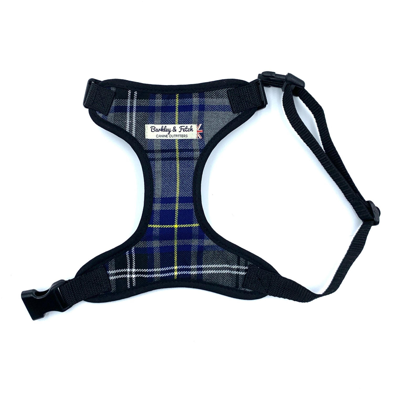 Plaid dog harness with visible brand label on a white background