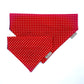 Red polka dot bandana with a brand tag on a white background