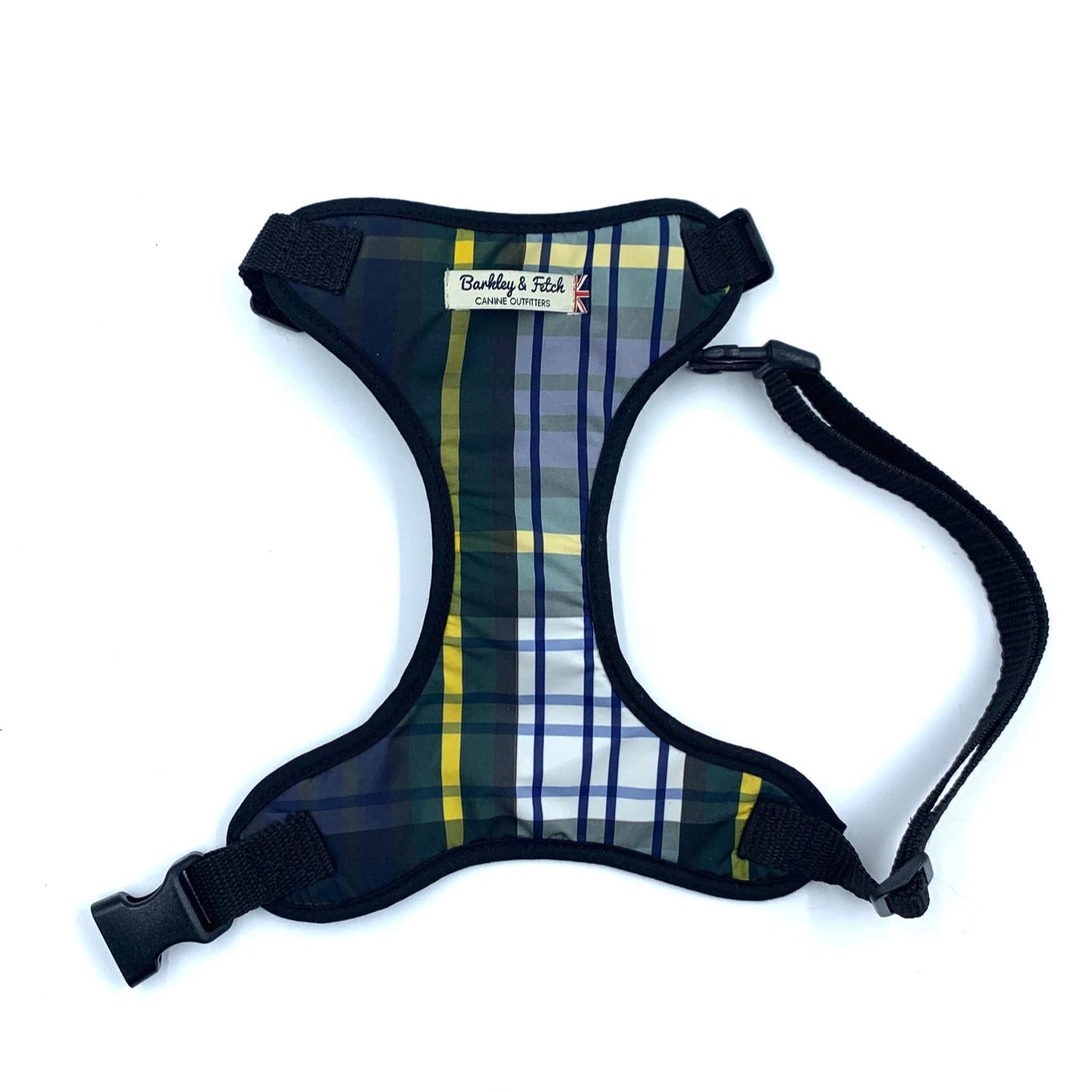 A weatherproof tartan fabric dog harness with a side release buckle and webbing, featuring a plaid pattern.