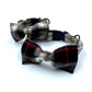 Plaid bow tie and collar set on a white background