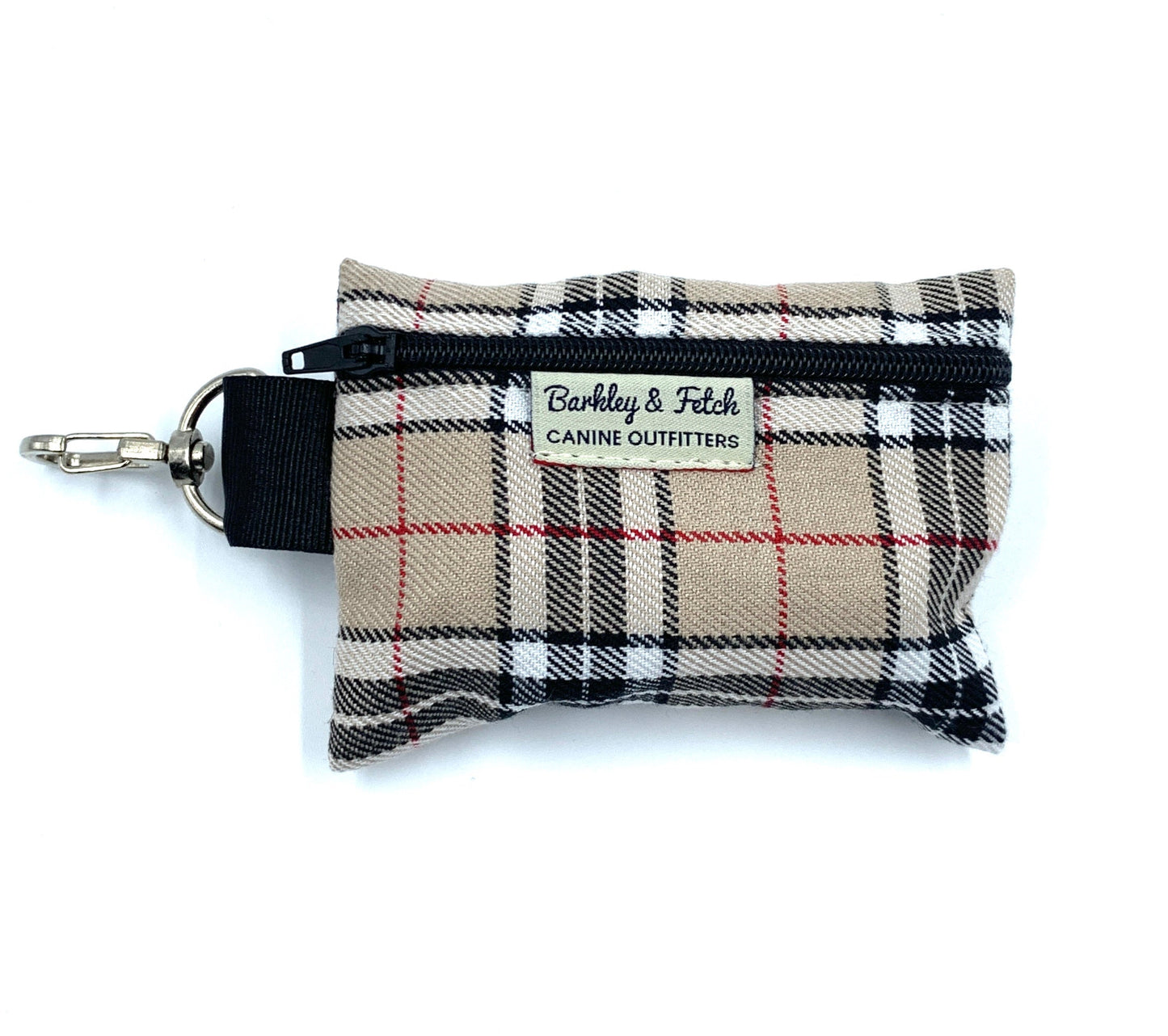 A caramel tartan poo bag holder with a keyring attachment, featuring a zippered closure and the brand 'Barkley & Fetch' embroidered on the front.