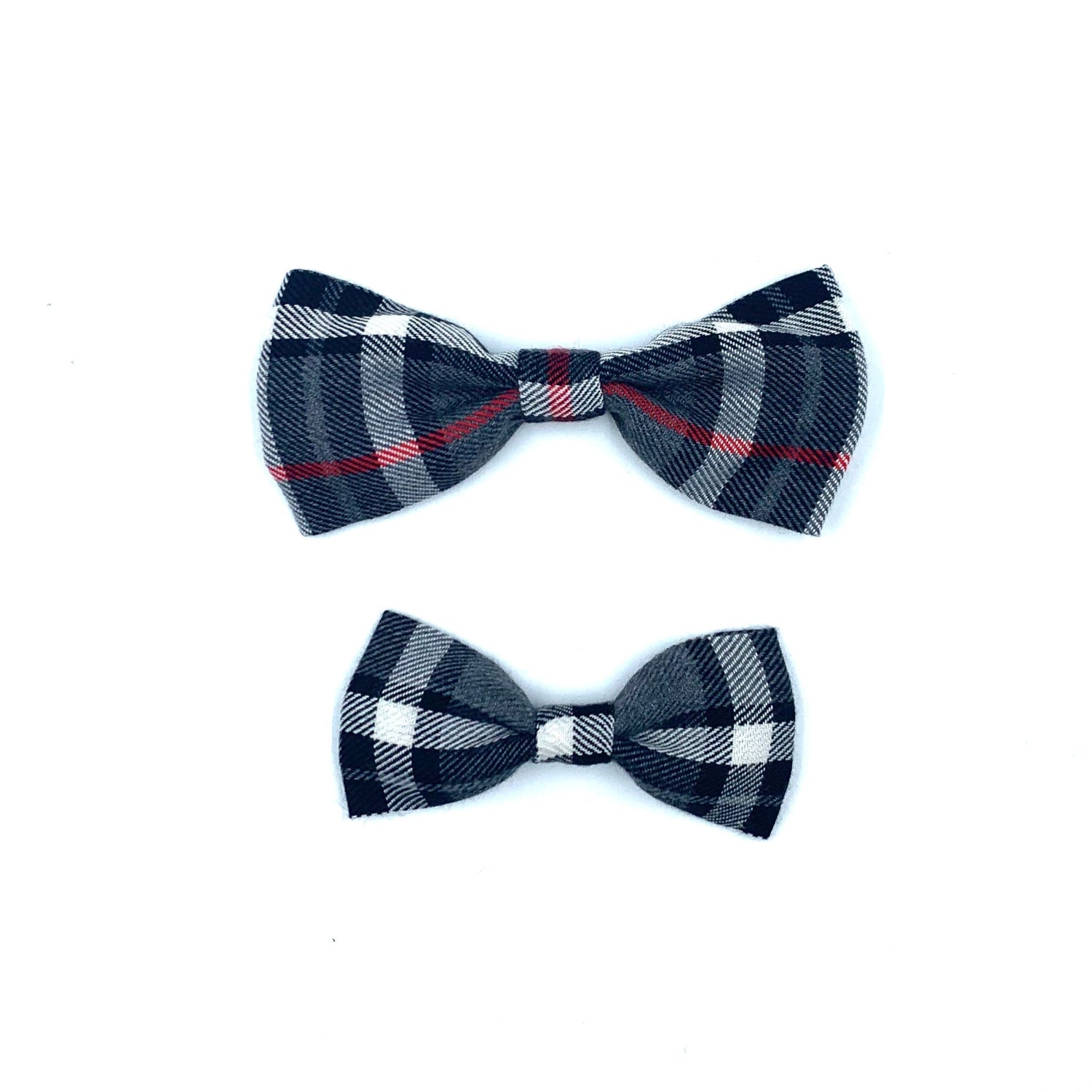 Two plaid bow ties on a white background