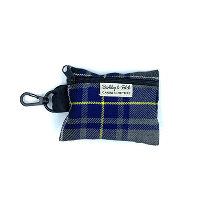 A Navy/Grey Tartan poo bag holder with a clip and zipper, displaying a checkered pattern.