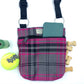 Plaid dog treat pouch with tennis ball and bones on a white background. Handmade by Barkley and Fetch on our UK workshop