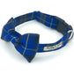 Blue plaid dog collar with bow tie on a white background