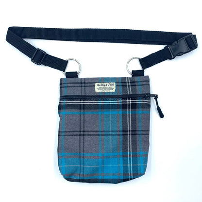 A turquoise and grey tartan dog walk and treat bag with an adjustable shoulder strap, zip fastening, and a special pocket. Handmade in the Uk by Barkley and Fetch