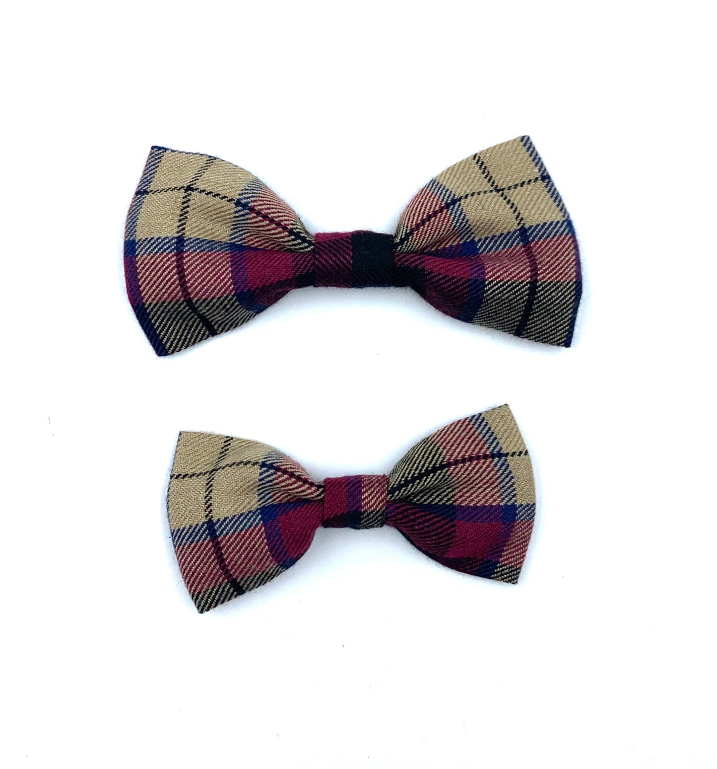 Two plaid bow ties on a white background